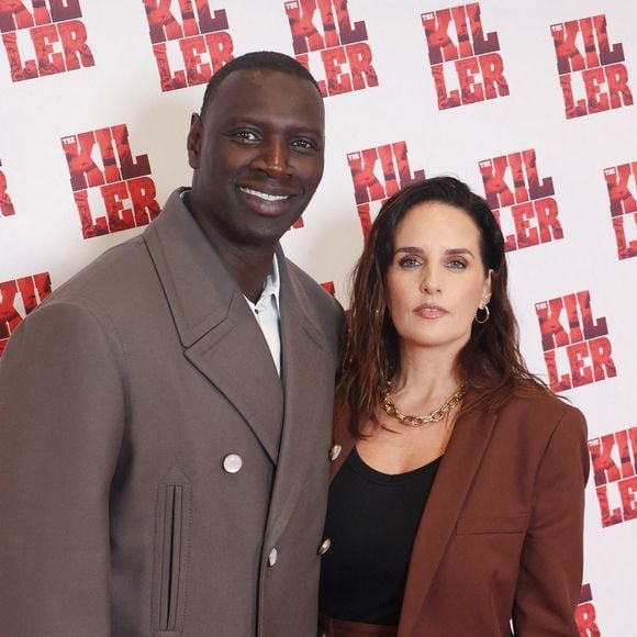 Omar Sy et Helene Sy assistent à la première de " Killer " qui s'est tenue au Pathe Palace à Paris, France, le 21 octobre 2024. Photo par Jerome Dominé/ABACAPRESS.COM