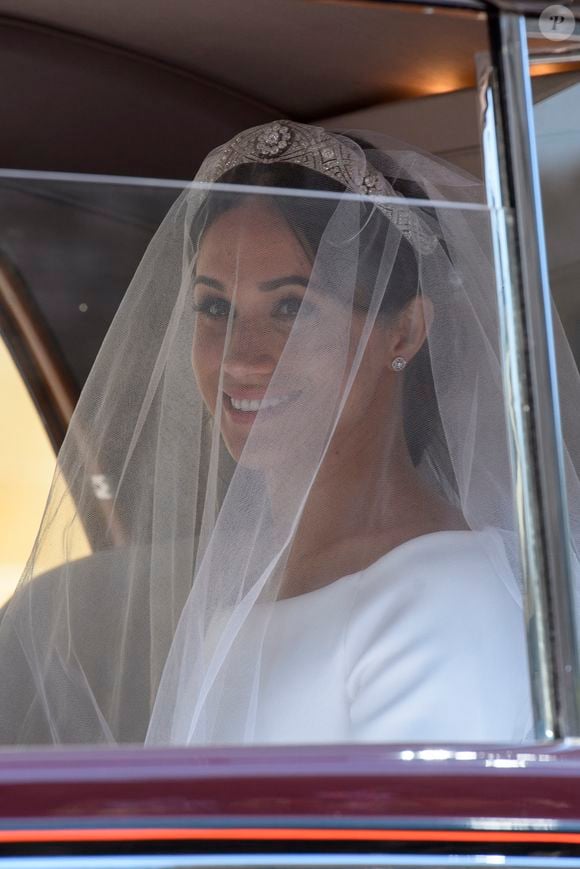 Meghan Markle, duchesse de Sussex arrive à la chapelle St. George au château de Windsor à bord d'une Rolls Royce - Mariage du prince Harry et de Meghan Markle au château de Windsor le 19 mai 2018.