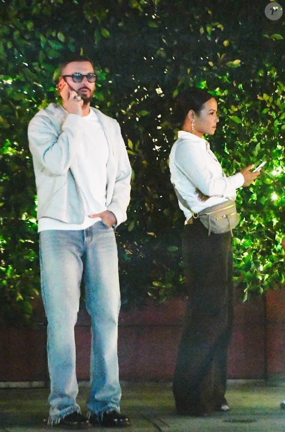 EXCLUSIF : Christina Milian et Matt Pokora ont été aperçus lors d'une rare soirée à Los Angeles. La chanteuse et actrice américaine de 44 ans était décontractée dans un chemisier blanc associé à un pantalon marron.