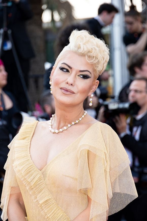 Son message a ému ses abonnés et de nombreuses personnalités, dont Claude Dartois, qui lui ont exprimé leur soutien.

Katrina Patchett - Montée des marches du film « Club Zéro » lors du 76ème Festival International du Film de Cannes, au Palais des Festivals à Cannes. Le 22 mai 2023

© Jacovides-Moreau / Bestimage