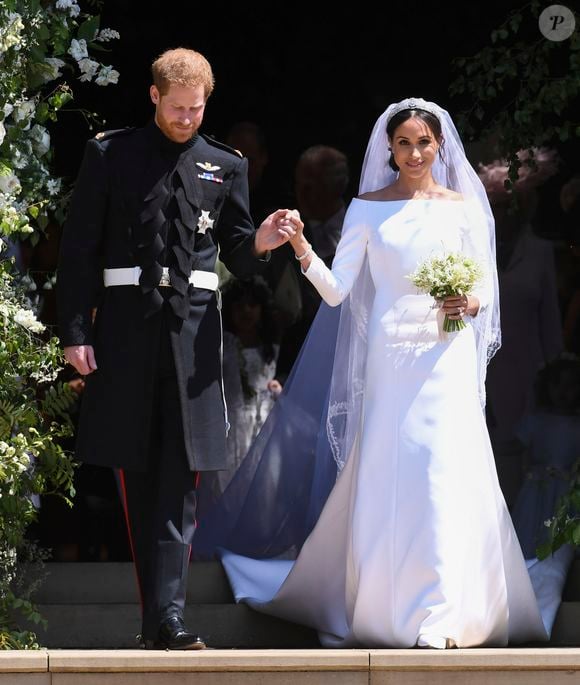 Le 19 mai 2018 à la chapelle Saint-Georges à Windsor, au Royaume-Uni, le prince Harry et Meghan Markle s'étaient unis pour le meilleur et pour le pire !

Le prince Harry, duc de Sussex, et Meghan Markle, duchesse de Sussex, à la sortie de chapelle St. George au château de Windsor - Sortie après la cérémonie de mariage du prince Harry et de Meghan Markle en la chapelle Saint-George au château de Windsor, Royaume Uni, le 19 mai 2018. (AGENCE / BESTIMAGE).