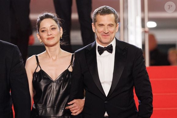 Marion Cotillard et Guillaume Canet - Descente des marches du film " Karma " lors du 79ème Festival International du Film de Cannes, le 15 mai 2026. © Jacovides-Moreau / Bestimage
|M - Descente des marches du film " Karma " lors du 79ème Festival International du Film de Cannes