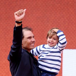 Le fils de ​​Rafael Nadal fait le show au milieu des légendes du tennis

Rafael Nadal et son fils Rafael Junior - Hommage à Rafael Nadal lors des internationaux de France de tennis à Roland-Garros. © Dominique Jacovides / Cyril Moreau / Bestimage