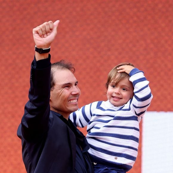 Le fils de ​​Rafael Nadal fait le show au milieu des légendes du tennis

Rafael Nadal et son fils Rafael Junior - Hommage à Rafael Nadal lors des internationaux de France de tennis à Roland-Garros. © Dominique Jacovides / Cyril Moreau / Bestimage
