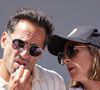 Florent Peyre et sa compagne Virginie Stref dans les tribunes lors des Internationaux de France de Tennis de Roland Garros 2023. Paris, le 29 mai 2023. © Jacovides / Moreau / Bestimage