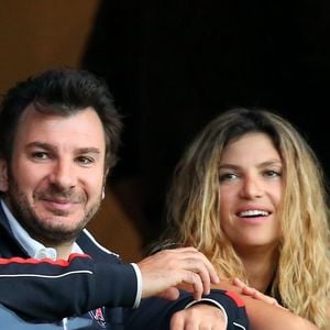 Michael Youn et Isabelle Funaro - People a la 35eme journee du championnat de France de football, au Parc des Princes, entre le PSG et Valenciennes (1-1) a Paris le 5 mai 2013. (JACOVIDES-MOREAU / BESTIMAGE).