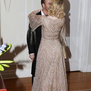 Exclusif - Émilie Dequenne (en Dior) et son mari Michel Ferracci (en Fursac) arrivent à la maison de l'ambassadeur de Belgique à Los Angeles après la 95ème édition de la cérémonie des Oscars le 12 mars 2023. Elle est venue soutenir le film du réalisateur belge Lukas Dhont "Close" aux Oscars. Malheureusement, le film n'a pas été primé.