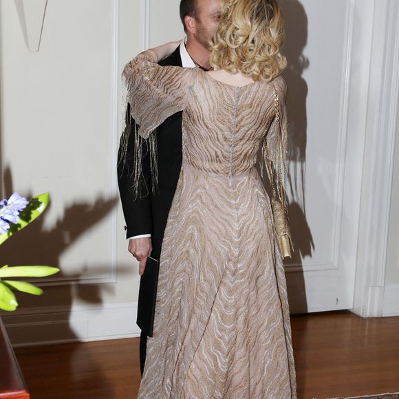 Exclusif - Émilie Dequenne (en Dior) et son mari Michel Ferracci (en Fursac) arrivent à la maison de l'ambassadeur de Belgique à Los Angeles après la 95ème édition de la cérémonie des Oscars le 12 mars 2023. Elle est venue soutenir le film du réalisateur belge Lukas Dhont "Close" aux Oscars. Malheureusement, le film n'a pas été primé.