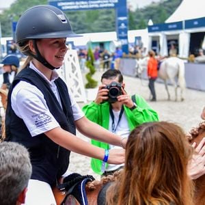 Nicolas Sarkozy, sa femme Carla Bruni et leur fille Giulia Sarkozy après le prix Kids Cup L’Envol dans l'Espace VIP lors de la 10ème édition du "Longines Paris Eiffel Jumping" à la Plaine de Jeux de Bagatelle à Paris, France, le 21 juin 2024. © Perusseau-Veeren/Bestimage