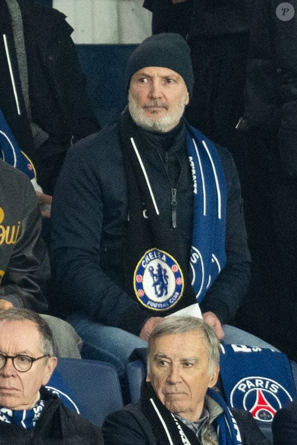 Frank Lebœuf - Célébrités dans les tribunes du match de 8ème de finale aller de la Ligue Des Champions 2025-2026 (LDC) "PSG - Chelsea (5-2)" au Parc des Princes à Paris le 11 mars 2026. © Cyril Moreau/Bestimage