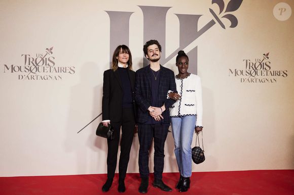 Exclusif - Sophie Marceau, son fils Vincent Żuławski, Eye Haïdara - Photocall de l'avant-première du film "Les Trois Mousquetaires : D'Artagnan" aux Invalides à Paris le 21 mars 2023.

© Moreau / Jacovides / Guirec / Bestimage