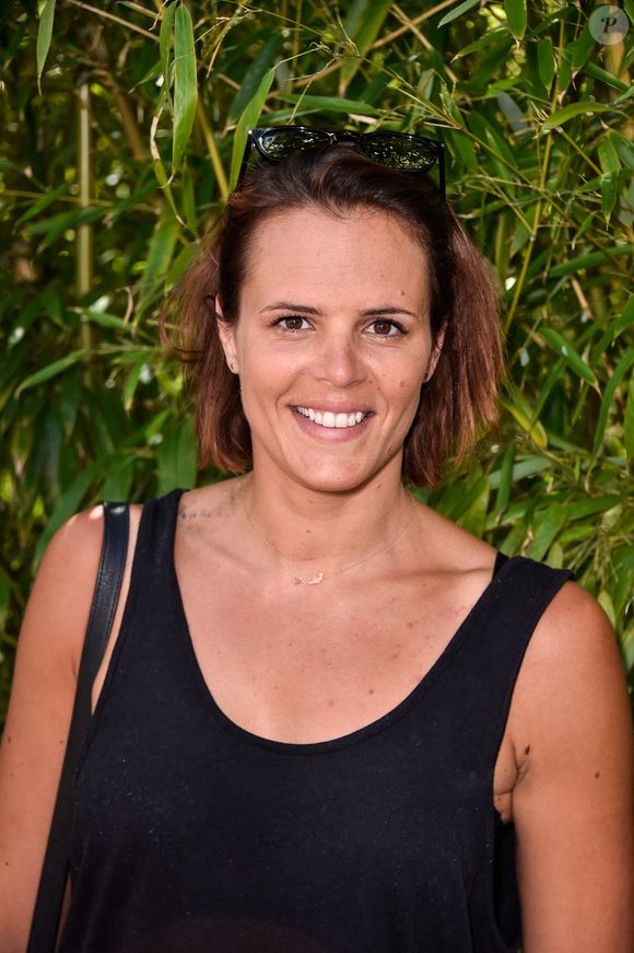 Laure Manaudou pose au village lors de la finale hommes de l'édition 2015 de Roland Garros, le 7 juin 2015 à Paris, France. Photo par Nicolas Gouhier/ABACAPRESS.COM