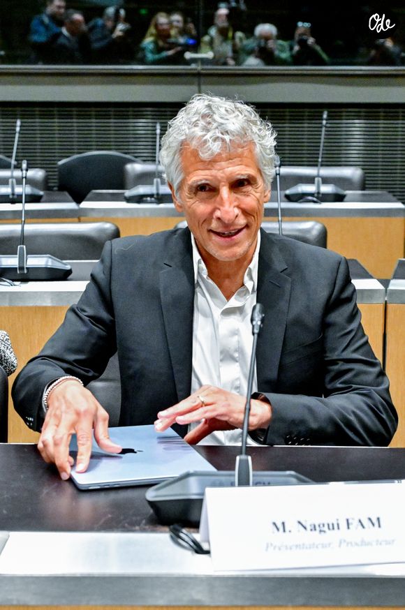 Le présentateur de télévision et producteur audiovisuel Nagui assiste à une audition de la Commission d'enquête parlementaire sur la neutralité, le fonctionnement et le financement du service public de radiodiffusion français à l'Assemblée nationale, à Paris, France, le 1er avril 2026. © Christian Liewig/Bestimage
