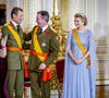 Seuls 130 invités, triés sur le volet, ont été conviés.

Grand-Duc Henri (Le grand-duc Henri de Luxembourg), Grande Duchesse Maria Teresa (La grande-duchesse Maria Teresa de Luxembourg), Grand-duc Guillaume (Le prince Guillaume, grand-duc héritier de Luxembourg), Stéphanie de Luxembourg (La comtesse Stéphanie de Lannoy, grande-duchesse héritière de Luxembourg), cérémonie d'adieu au Palais grand-ducal dans le cadre des célébrations marquant le changement de trône à Luxembourg, jour 1 à Luxembourg-Ville, Luxembourg, 3 octobre 2025. Photo by Dana Press / Bestimage