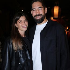 Exclusive - Nikola Karabatic et sa femme Geraldine Pillet assistent au lancement du livre de Philippe Spanghero " Au Nom du Clan " organisé par Five Eyes Production au Buddha Bar à Paris, France, le 11 septembre 2025. Photo by Jerome Domine/ABACAPRESS.COM