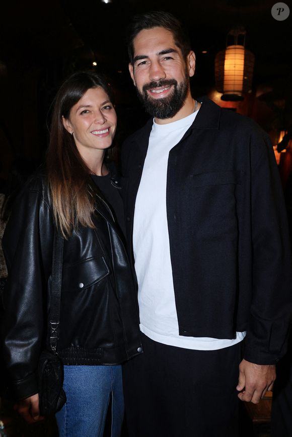 Exclusive - Nikola Karabatic et sa femme Geraldine Pillet assistent au lancement du livre de Philippe Spanghero " Au Nom du Clan " organisé par Five Eyes Production au Buddha Bar à Paris, France, le 11 septembre 2025. Photo by Jerome Domine/ABACAPRESS.COM