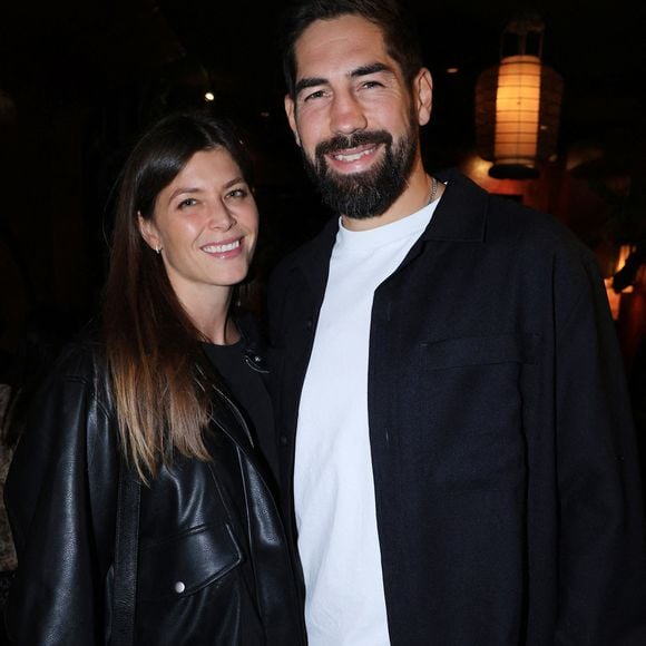 Exclusive - Nikola Karabatic et sa femme Geraldine Pillet assistent au lancement du livre de Philippe Spanghero " Au Nom du Clan " organisé par Five Eyes Production au Buddha Bar à Paris, France, le 11 septembre 2025. Photo by Jerome Domine/ABACAPRESS.COM