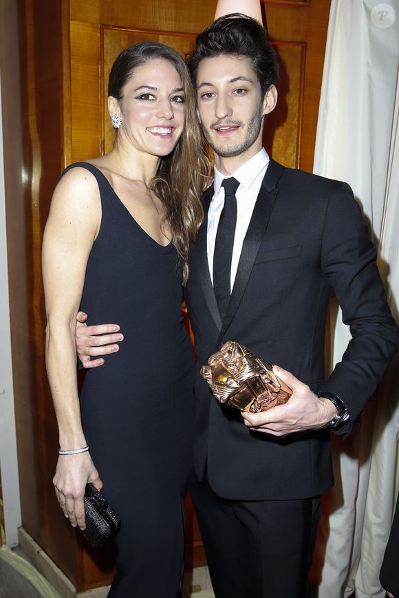 Natasha Andrews (Bijoux Van Cleef) et son compagnon Pierre Niney, César du meilleur acteur dans Yves Saint Laurent en Costume Dior, montre Montblanc - Dîner au Fouquet's lors de la 40ème cérémonie des César à Paris le 20 février 2015. © BORDE-JACOVIDES / BESTIMAGE