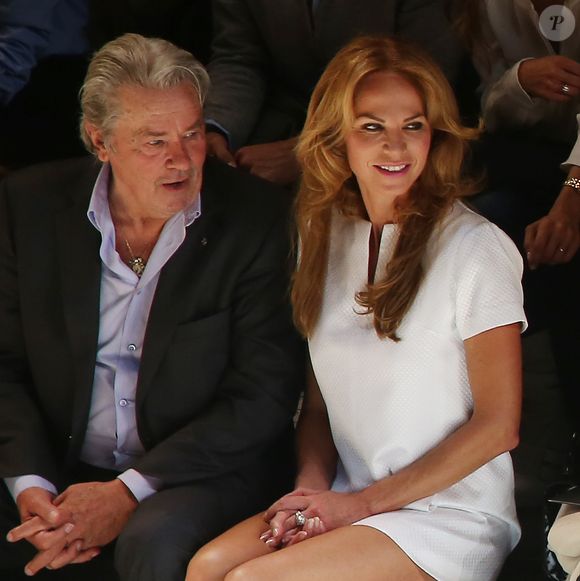 Alain Delon et Rosalie Van Breemen au défilé de mode Elie Saab - Collection prêt-a-porter printemps-été 2013 - Paris le 03/10/2012 (Borde / Pix4U / Bestimage)