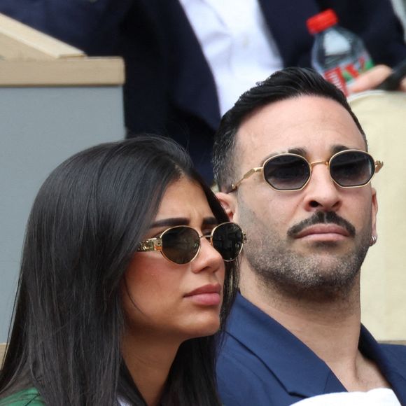 Louana Franco, Adil Rami en tribune lors des Internationaux de France 2025 à Roland Garros le 01 juin 2025 à Paris, France. Photo by Nasser Berzane/ABACAPRESS.COM