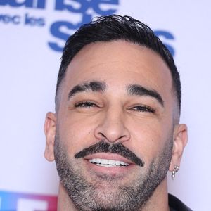 Adil Rami participe au photocall de Danse Avec Les Stars dans les studios de TF1 le 16 janvier 2025. Photo by Jerome Domine/ABACAPRESS.COM