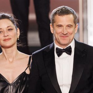 Interrogés en 2023 par Léna Situations sur les histoires d'amour qui peuvent naître entre partenaires de tournage, ils avaient reconnu : "On n'est pas les meilleurs exemples."

Marion Cotillard et Guillaume Canet - Descente des marches du film "Karma" lors du 79ème Festival International du Film de Cannes, le 15 mai 2026. © Jacovides-Moreau / Bestimage