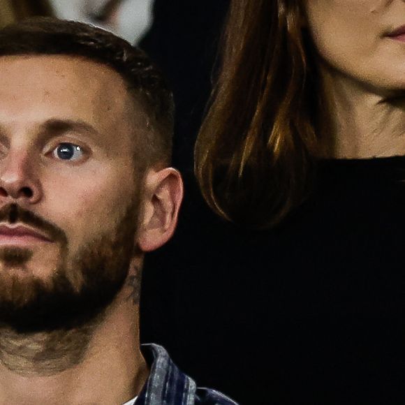 Christina Milian et son mari M. Pokora (Matt Pokora) - Célébrités dans les tribunes lors du match de qualification pour la Coupe du Monde 2026 entre la France et l'Islande (2-1) au Parc des Princes à Paris le 9 septembre 2025. © Zuma Press / Bestimage
