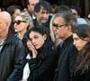 Si les ultimes adieux ont été rendus en l’église Saint-Jean-de-Montmartre, dans le 18e arrondissement de la capitale, le 24 avril dernier, lors de touchantes funérailles, Cylia et Shana continuent de porter leur mère dans leurs cœurs.

Cylia Chasman et son père Steven Chasman, Shana Chasman - Sortie des obsèques de Nadia Farès en l'église Saint-Jean-de-Montmartre à Paris, le 24 avril 2026. N.Farès est décédée le 17 avril 2026 quelques jours après un "incident cardiaque" survenu le 12 avril 2026 dans la piscine du complexe sportif, Blanche (9ème). 
© Gedeon Taieb / Bestimage