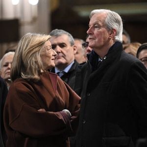 Le Premier ministre français sortant Michel Barnier et son épouse Isabelle Altmayer arrivent pour assister à la première messe publique au cours de laquelle l'archevêque de Paris dirigera les prières pour consacrer le nouvel autel principal, à la cathédrale Notre-Dame de Paris, à Paris, le 8 décembre 2024. Photo by Eliot Blondet/ABACAPRESS.COM