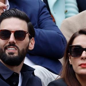 Sofia Essaïdi et son compagnon Adrien Galo - People dans les tribunes lors des Internationaux de France de Tennis de Roland Garros 2022 à Paris le 29 mai 2022. © Cyril Moreau/Bestimage