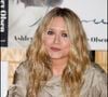 Mary-Kate, qui épousera plus tard Olivier Sarkozy, et sa soeur lancent en effet la marque The Row en 2006.

Mary-Kate Olsen lors d'une séance de dédicaces organisée pour la sortie de leur livre Influence, dans une librairie de Westwood, à Los Angeles, le 12 novembre 2008. À travers cet ouvrage, les jumelles donnent la parole aux personnalités créatives qui ont marqué leur parcours dans la mode et le design. Alain Rolland / Maxima Prod / Bestimage