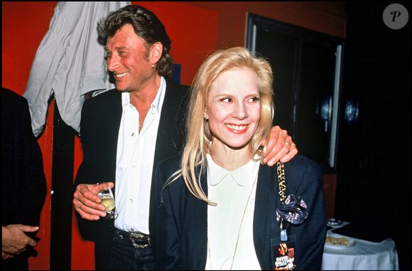 Archives - Johnny Hallyday et Sylvie Vartan lors d'un concert de leur fils David Hallyday en 1991.
Crédit : AGENCE / BESTIMAGE