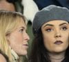 Une douce soirée pour l'artiste qui avait évoqué sa rupture douloureuse avec Gia Martinelli survenue fin 2024 et qu'elle avait mis en musique dans le titre "Tu vas me quitter encore longtemps ?"

Hoshi avec une amie dans les tribunes du match de football de qualification pour la coupe du monde 2026 opposant la France à Azerbaïdjan (3-0) au Parc des Princes à Paris, France, le 10 octobre 2025. © Cyril Moreau/Bestimage