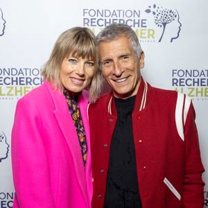 Nagui et sa femme Mélanie Page au photocall du concert du gala des 20 ans de la fondation Recherche Alzheimer "2 générations chantent pour la 3ème" à l'Olympia à Paris le 18 mars 2024. © Cyril Moreau / Bestimage