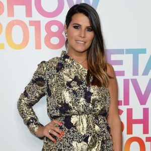 Karine Ferri assistant au défilé Etam dans le cadre de la semaine de la mode féminine printemps-été 2019 qui s'est tenue à Paris, France, le 25 septembre 2018. Photo by Aurore Marechal/ABACAPRESS.COM