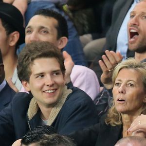 Exclusif - Claire Chazal avec son fils François Poivre d'Arvor et un ami le banquier Christophe de Backer assistent au quart finale de la Ligue des Champions de football au Parc des Princes entre le PSG et le FC Barcelone à Paris le 15 avril 2015.  © Jacovides - Moreau Bestimage