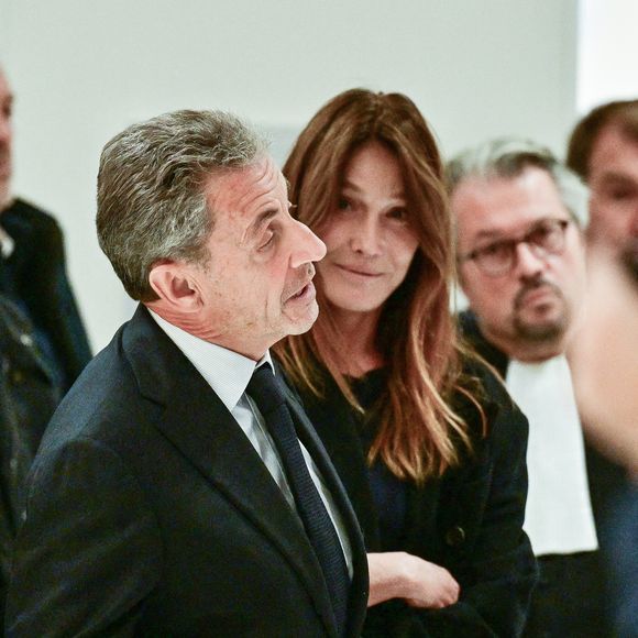 Nicolas Sarkozy et sa femme Carla Bruni - Nicolas Sarkozy condamné à 5 ans de prison à l'issue du procès de l'affaire du financement libyen au tribunal correctionnel de Paris, le 25 septembre 2025. L'ancien chef de l'Etat était accompagné de sa femme, C.Bruni. Nicolas Sarkozy, jugé coupable d’association de malfaiteurs, sera prochainement convoqué en vue de lui signifier la date de son incarcération. 
© Christian Liewig / Bestimage