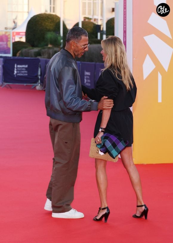 Roschdy Zem et sa compagne Sarah Poniatowski sur le tapis rouge lors de la première du film 'L'Invitation' pendant la 52ème édition du Festival du Cinéma Américain de Deauville, France, le 5 septembre 2026. © Denis Guignebourg/Bestimage