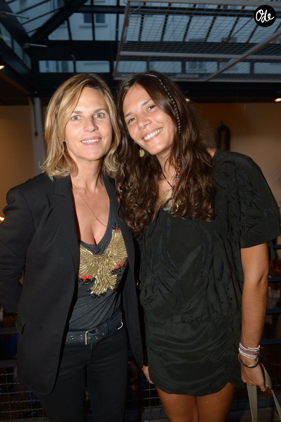 Virginie Coupérie-Eiffel et sa fille Vanille Clerc de la présentation de la collection Yepa, princesse de l'hiver de la marque Swildens chez Merci à Paris, le 26 septembre 2013.