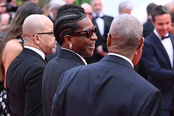 Denzel Washington (à droite) et ASAP Rocky (au centre) assistent à la première de Highest 2 Lowest lors du 78ème Festival de Cannes à Cannes, France. Date de la photo : lundi 19 mai 2025. 
Doug Peters/PA Wire