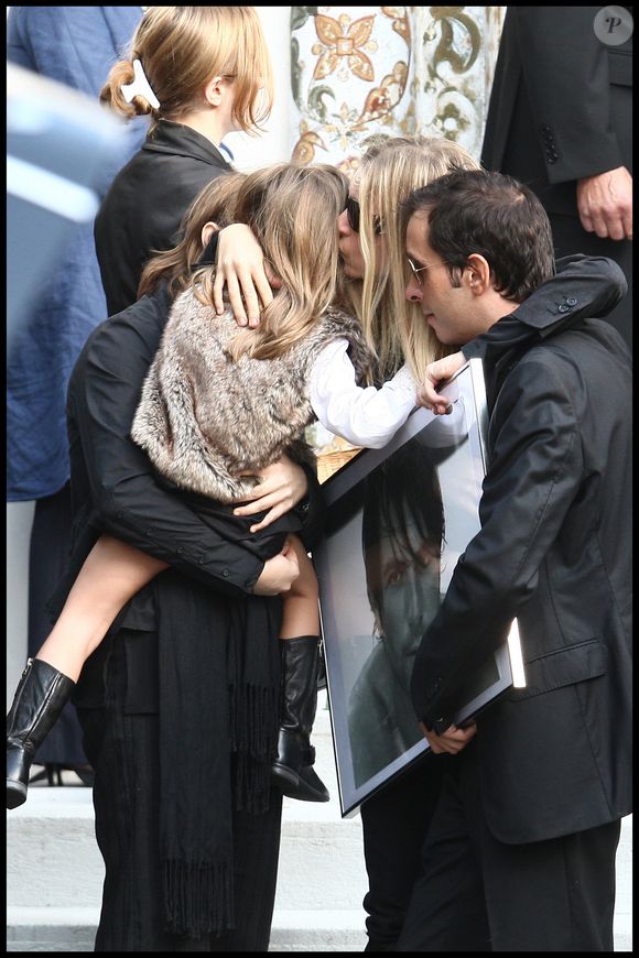 Valérie Bourdin, Sasha et Tanelle (fille de Valérie Bourdin) aux obsèques de Filip Nikolic à l'église Russe de Sainte Genevieve des Bois. Photo par JACOVIDES-MOREAU / BESTIMAGE