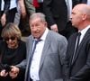 Si la présence de Guy Roux à Semur-en-Auxois fait parler, c'est que les apparitions de l'octogénaire se font de plus en plus rares.

Guy Roux lors de la sortie des obsèques de François Patriat, ancien ministre, en la collégiale de Semur-en-Auxois le 25 août 2026. © Dominique Jacovides / Bestimage
