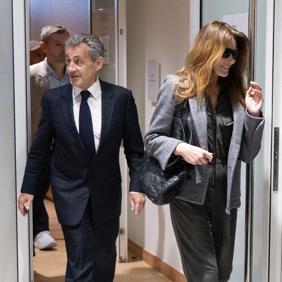 L'ancien président français Nicolas Sarkozy quitte le tribunal avec sa femme Carla Bruni au dernier jour de son procès pour financement illégal de campagne par la Libye pour sa candidature victorieuse à l'élection présidentielle de 2007, au tribunal de Paris à Paris, le 8 avril 2025. Photo par Raphael Lafargue/ABACAPRESS.COM