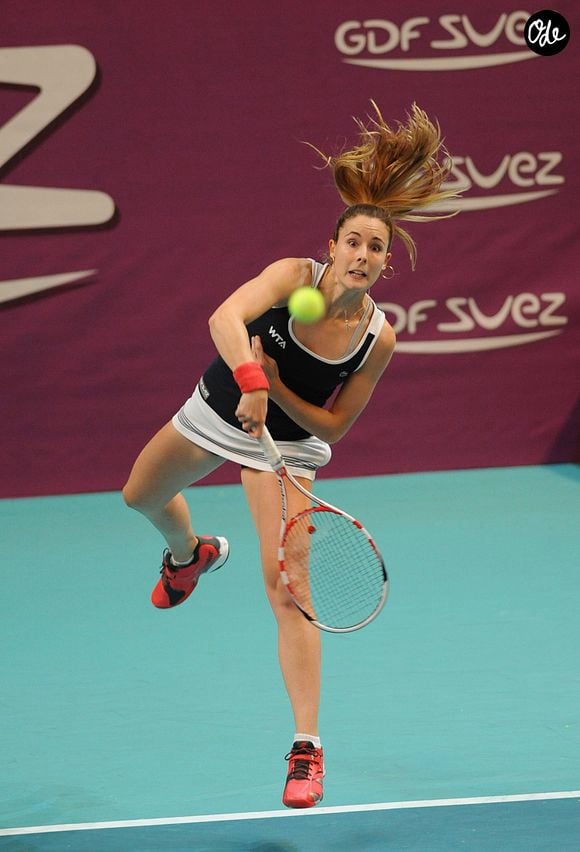 La francaise Alize Cornet - Alize Cornet (Fran) et Kristina Mladenovic (FRA) ont perdu face a Sara Errani (ITA) et Robert Vinci  (ITA) lors 1er tour double de l'Open GDF-SUEZ au Stade Pierre De Coubertin a Paris le 28 janvier 2013. Agence / Bestimage
