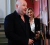 Pourtant accusé de viols et agressions sexuelles, la station de radio aurait eu des "discussions très avancées" avec l'animateur.
Sébastien Cauet et sa compagne Nathalie Dartois - Suspendu de l'antenne après une enquête pour viol, Sébastien Cauet réclame en justice son retour sur NRJ au tribunal de commerce de Paris, France, le 18 mars 2024. © Christiophe Clovis/Bestimage