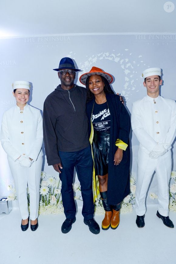 Exclusif - Lilian Thuram et sa femme Kareen Guiock Thuram lors de l'ouverture du rooftop de l'hôtel The Peninsula Paris le 29 mai 2024.

© Rachid Bellak / Bestimage