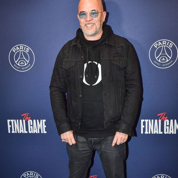 Le chanteur français Pascal Obispo pose pour un photo-call avant la finale de handball Liqui Moly Starligue entre le Paris Saint-Germain et le Pays d'Aix Universite Club à l'Accor Arena à Paris le 31 mai 2024. Photo by Firas Abdullah/ABACAPRESS.COM