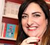 Cette expérience personnelle lui a notamment inspiré son roman "Et que ne durent que les moments doux".

Virginie Grimaldi - 38ème salon du livre de Paris à la Porte de Versailles, Paris le 17 mars 2018. © Cédric Perrin/Bestimage