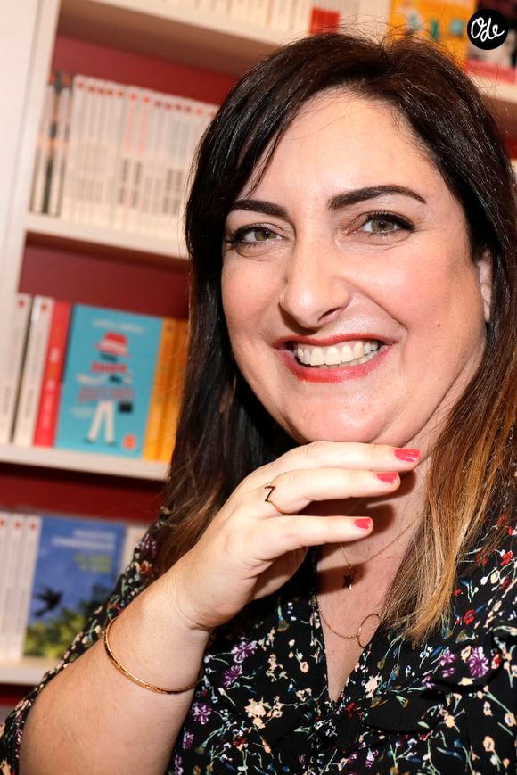 Cette expérience personnelle lui a notamment inspiré son roman "Et que ne durent que les moments doux".

Virginie Grimaldi - 38ème salon du livre de Paris à la Porte de Versailles, Paris le 17 mars 2018. © Cédric Perrin/Bestimage
