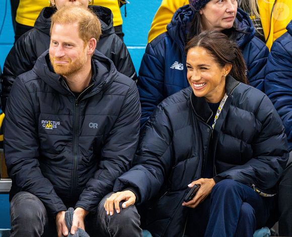 Le prince Harry, duc de Sussex et Meghan Markle, duchesse de Sussex, assistent à un match de basketball en fauteuil lors des "Invictus Games Vancouver Whistler 2025" à Vancouver, le 9 février 2025. (Backgrid USA / Bestimage)